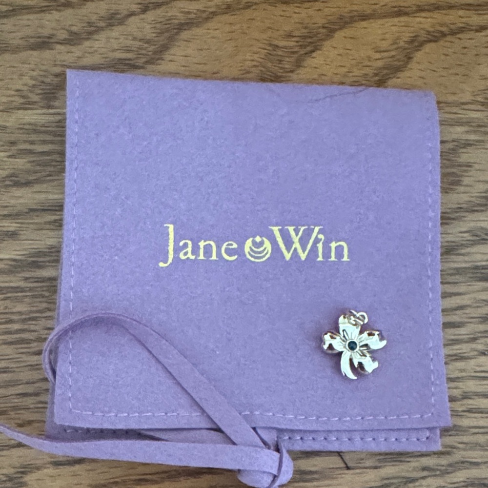 Jane Win clover charm